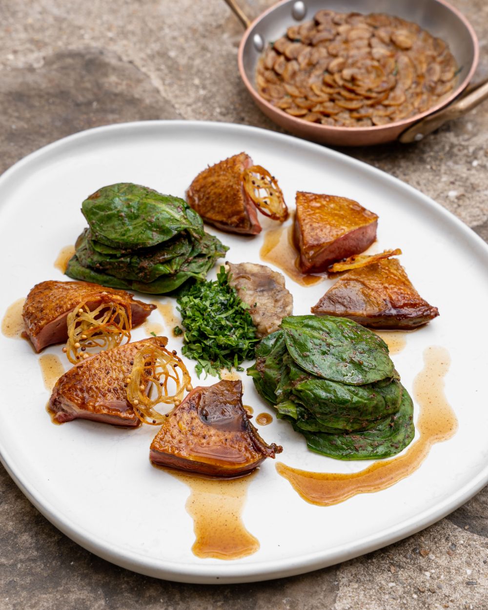 Simply-roasted pigeon with a spinach salad and spinach gratin, with garrigue flavours