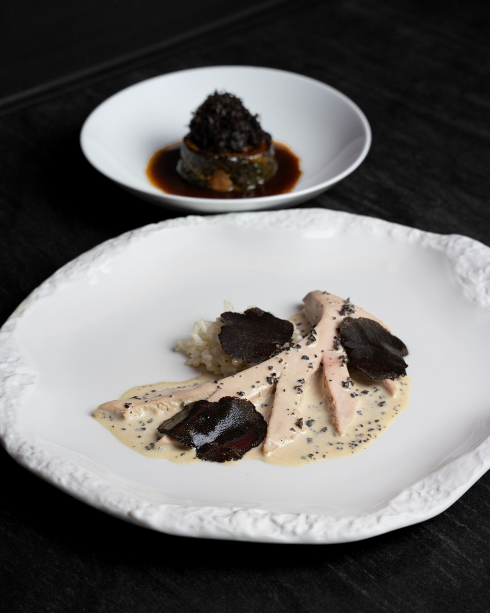 Poached free range guinea fowl, sauce Albufera, stuffed kale €195