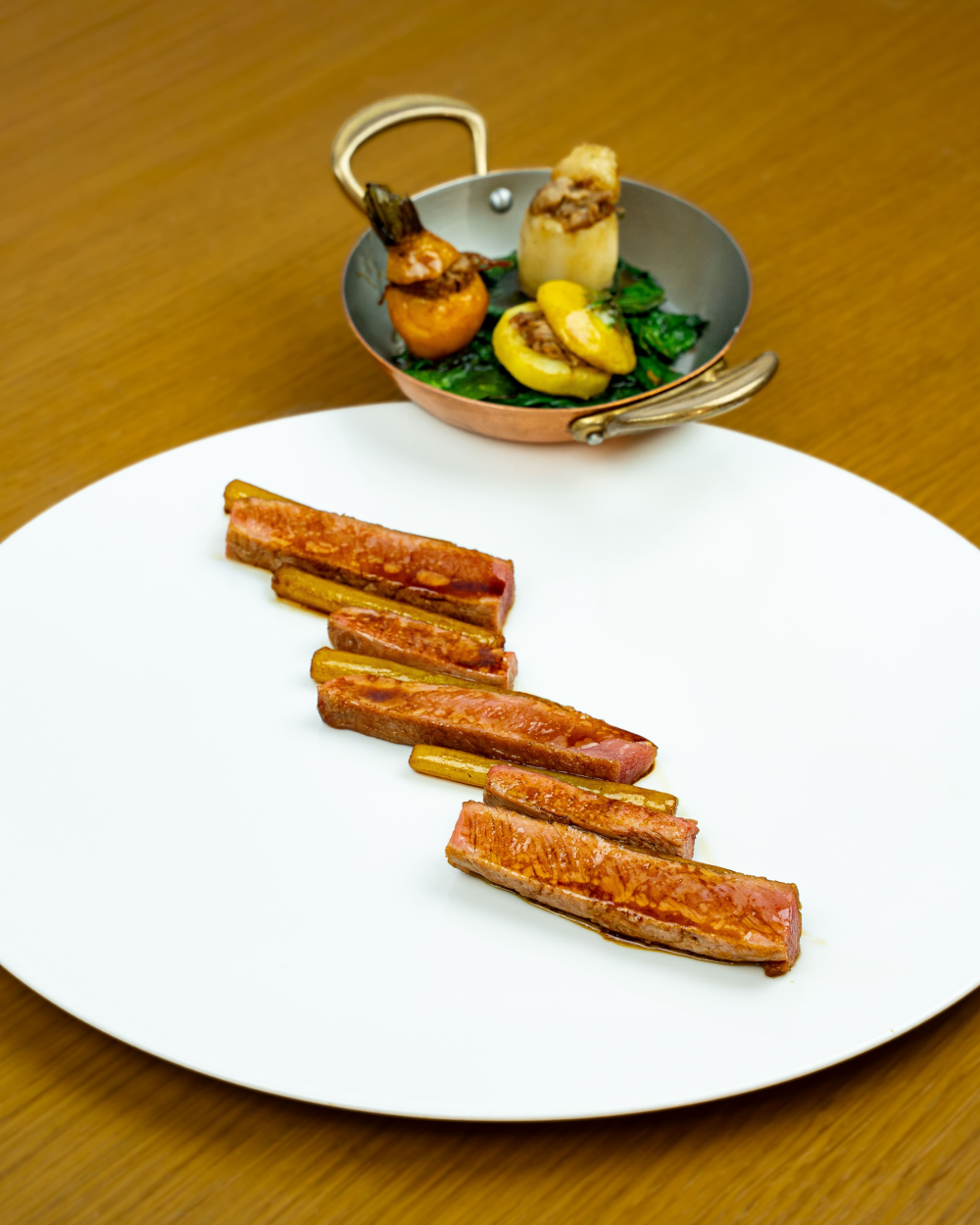 Roast saddle of lamb, salsify, stuffed vegetables and a simple jus €190